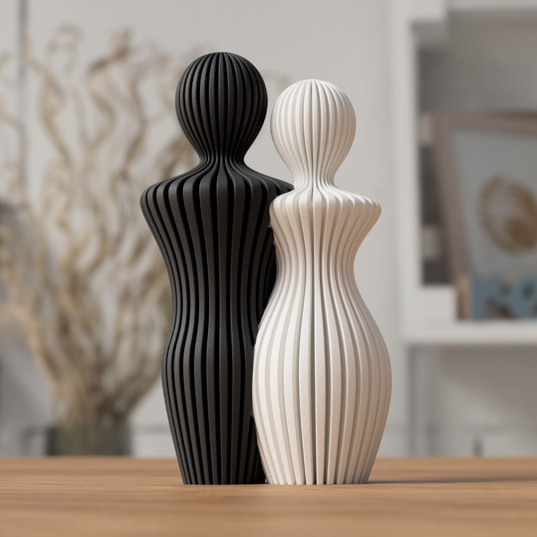 Detalje af Sabre par skulptur med rene linjer og minimalistisk udtryk i moderne boligindretning