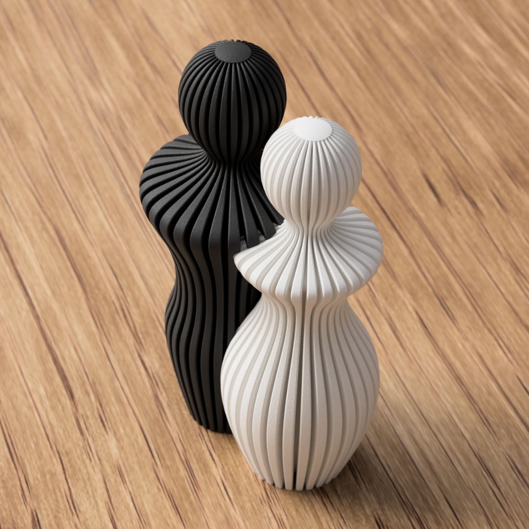 Sabre minimalistisk par statue i moderne design – stilren skulptur, der symboliserer kærlighed og samhørighed